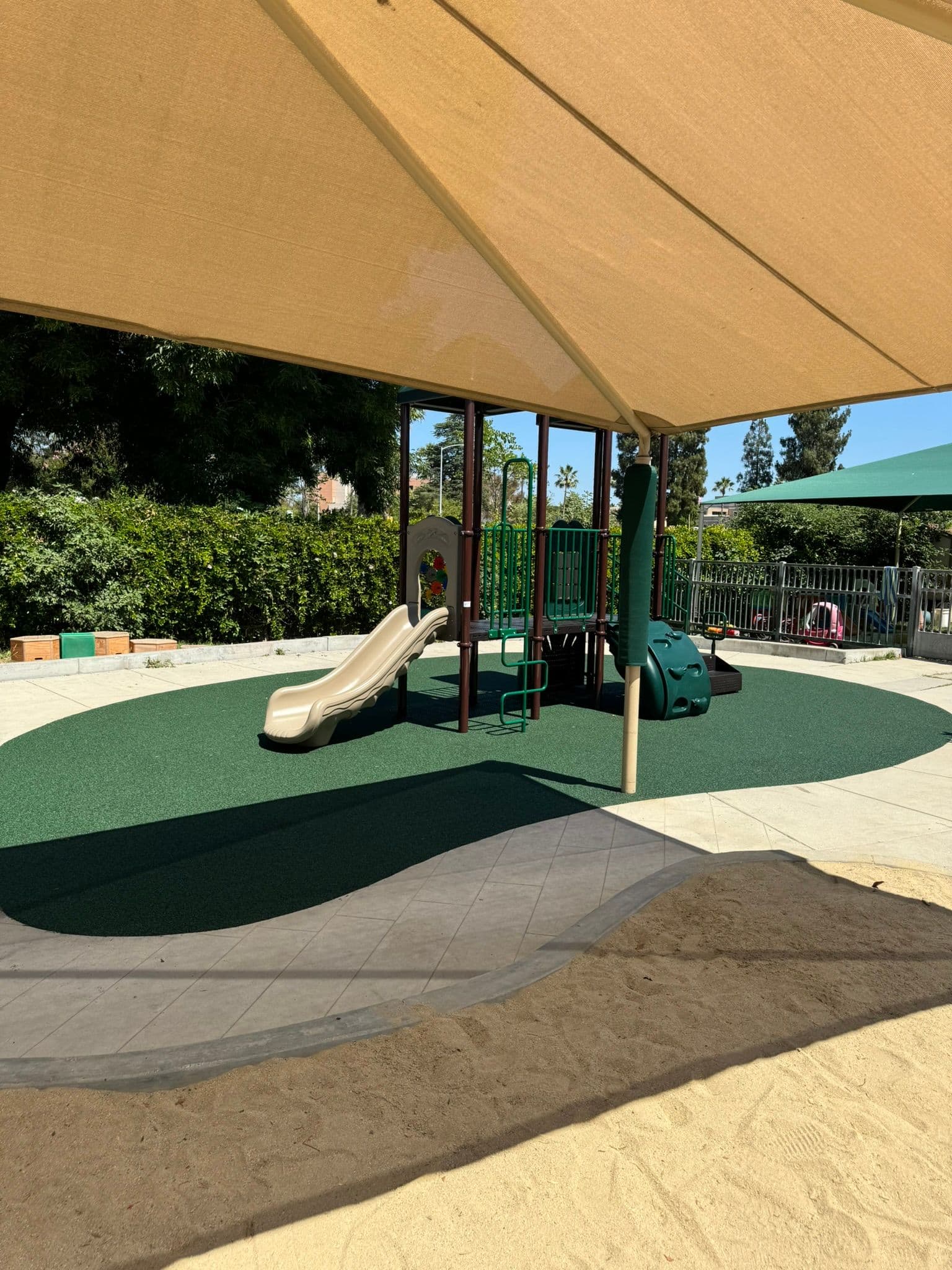 Kids Playground with green rubber surfacing