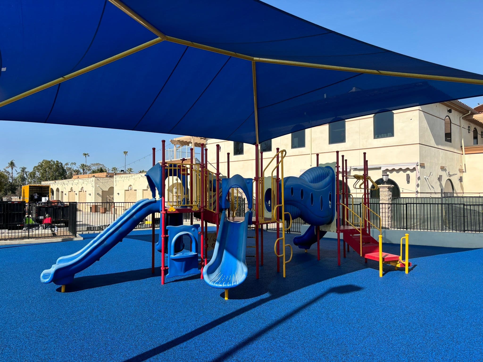School playground with blue rubber surfacing