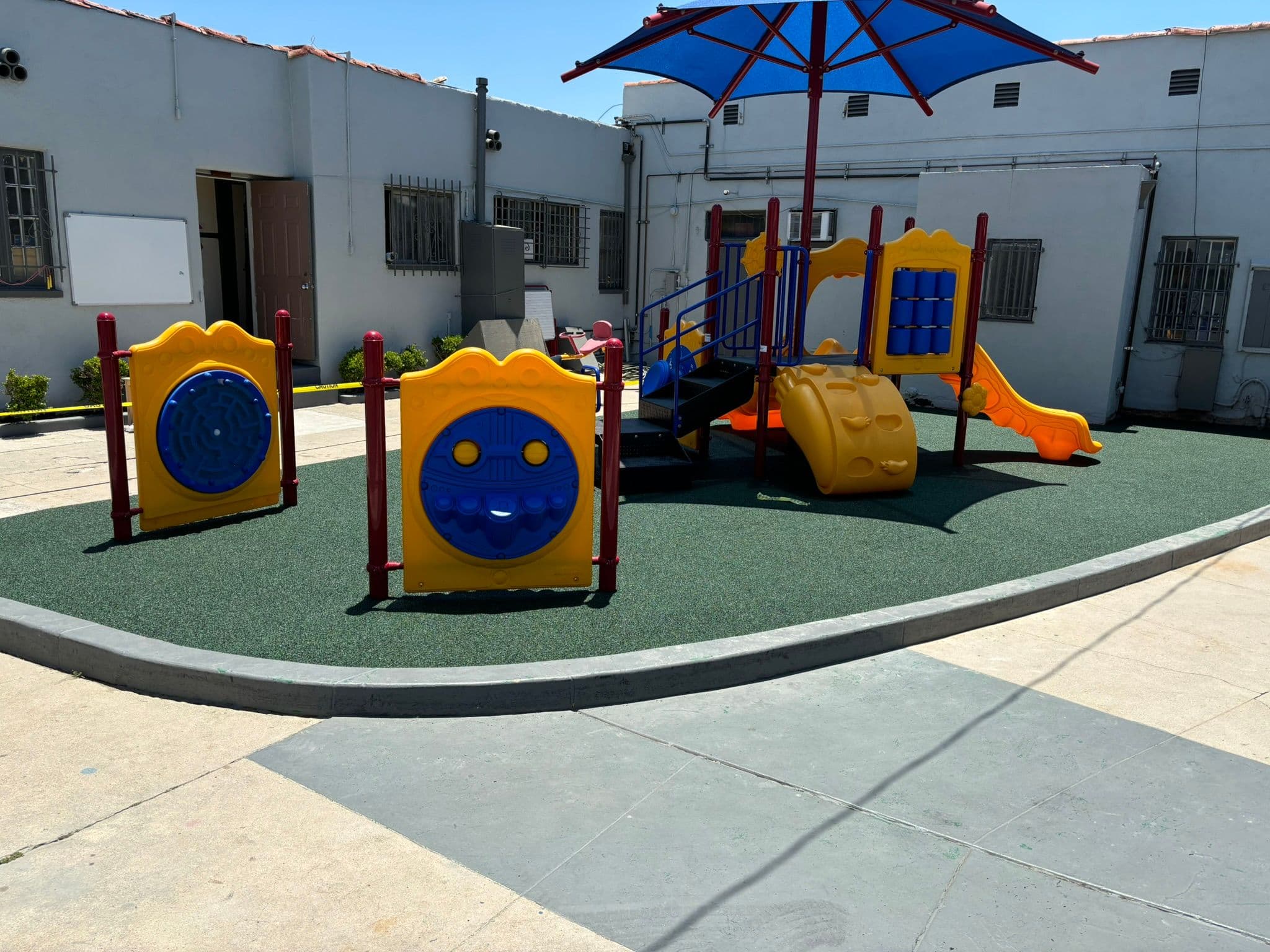 School Playground with green rubber surfacing