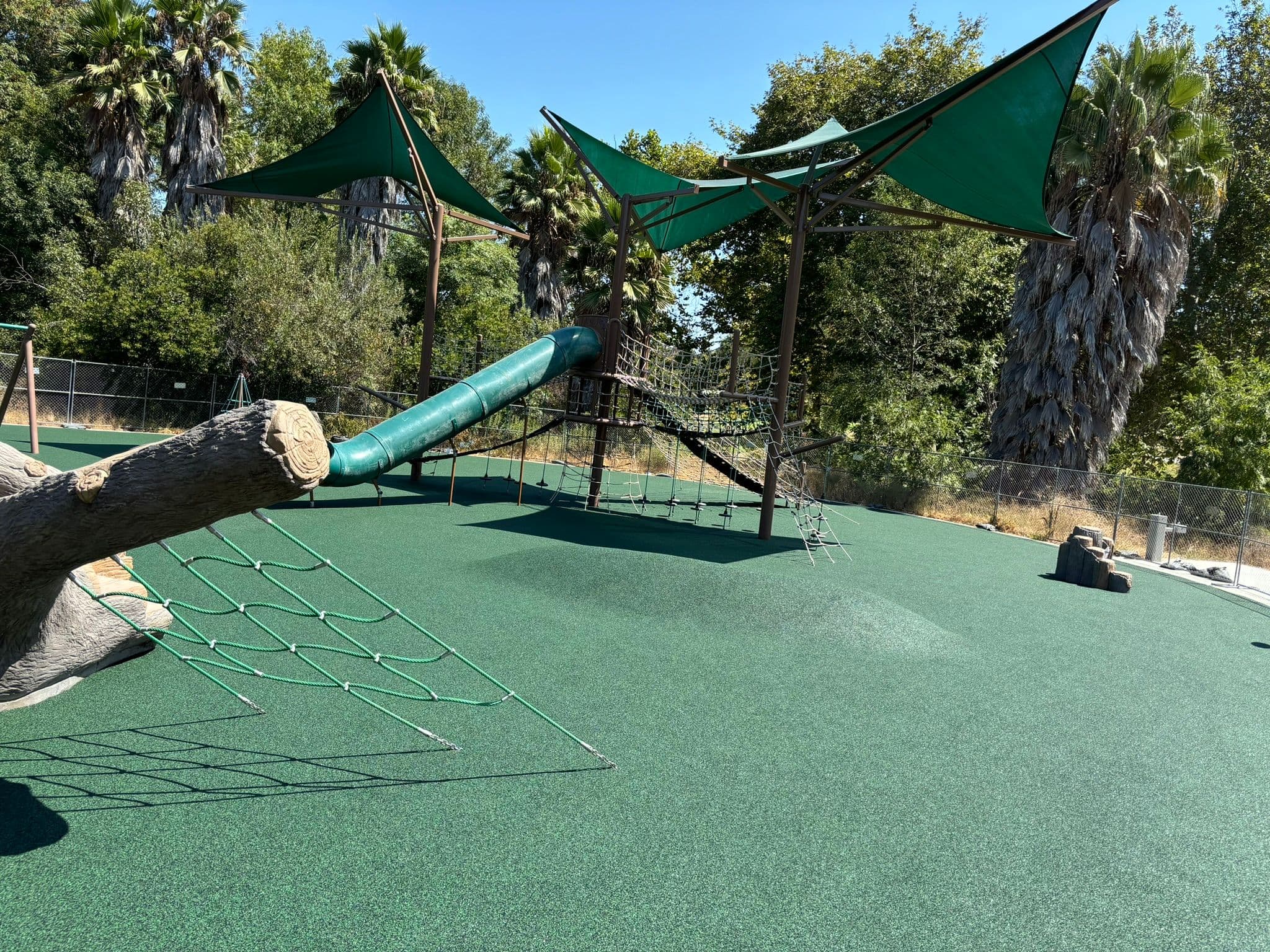 Large Playground with green rubber surfacing
